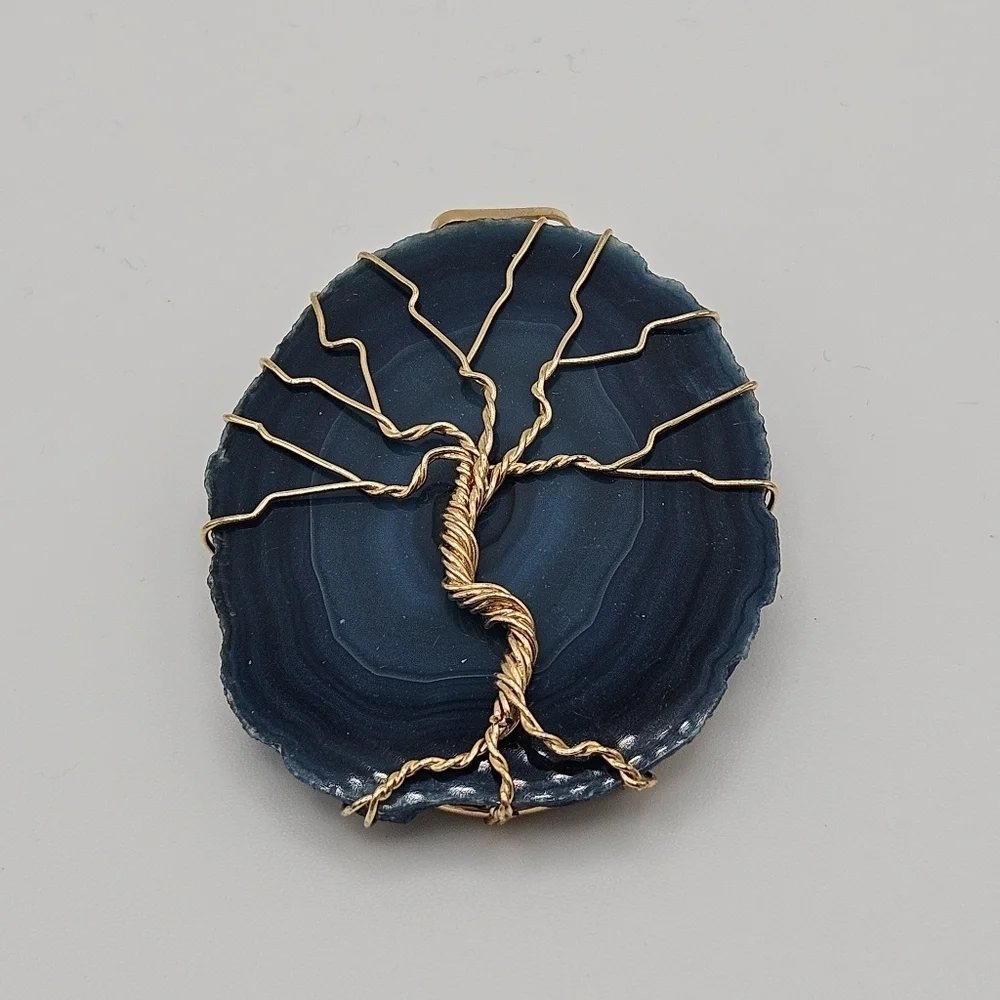 blue agate slice pendant with gold tone wire tree of life
